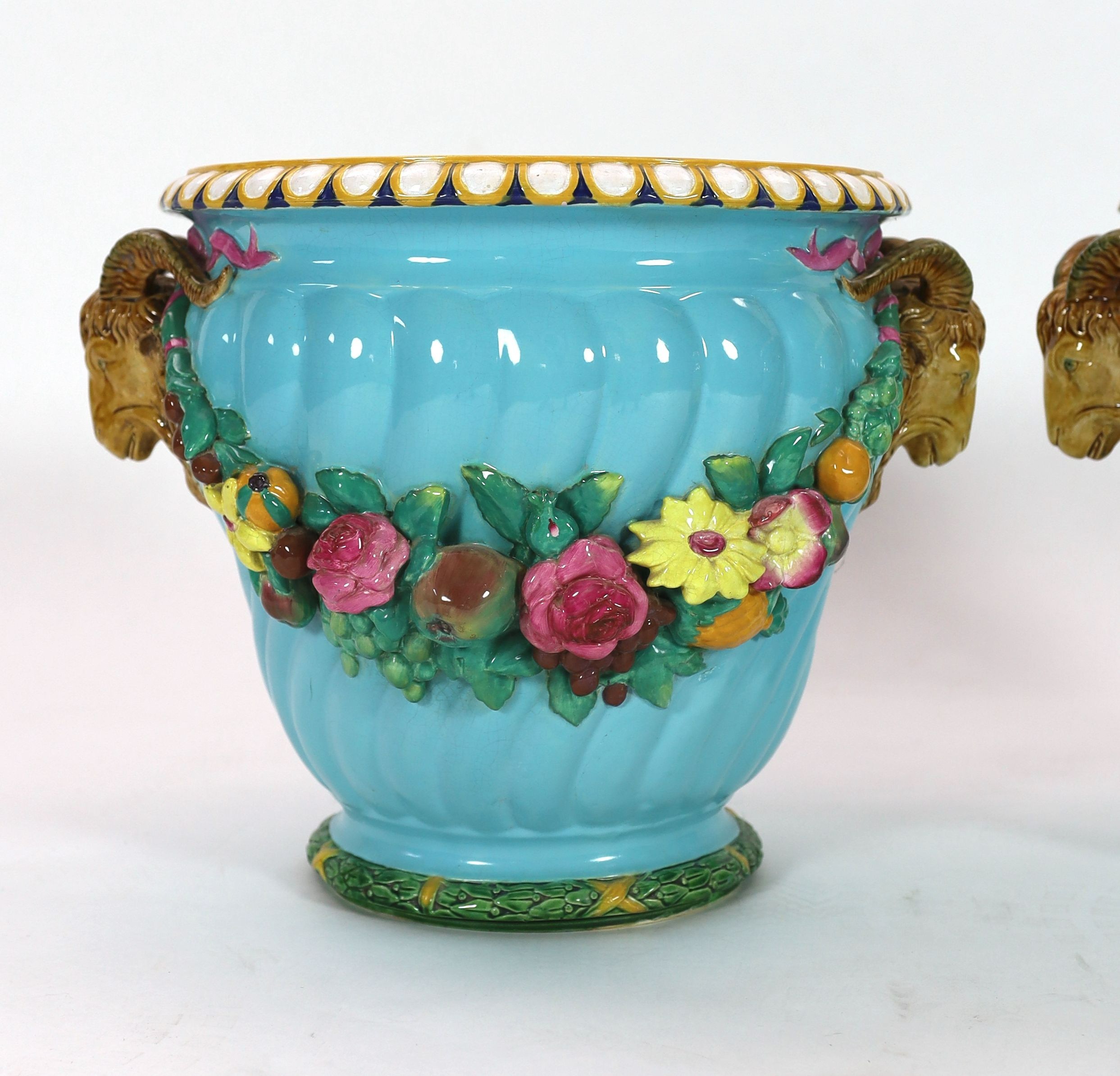 A pair of Minton classical revival majolica jardinieres, late 19th century, 37cm high, restored